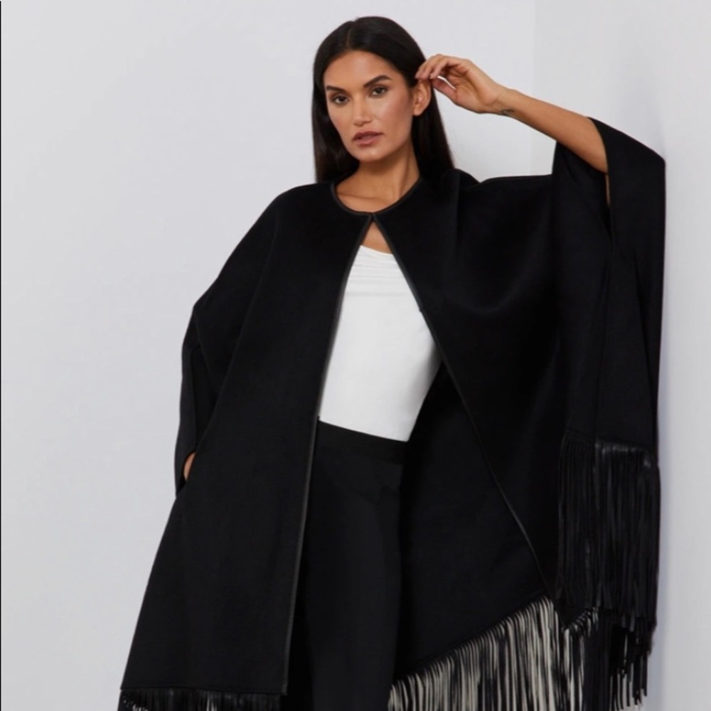 BCBG size OS handmade faux suede w/ leather fringes very warm not needed in FL